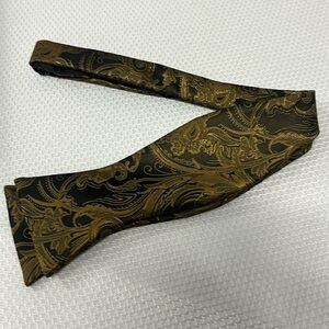 Cardi self tie bow tie. Black and gold tapestry.